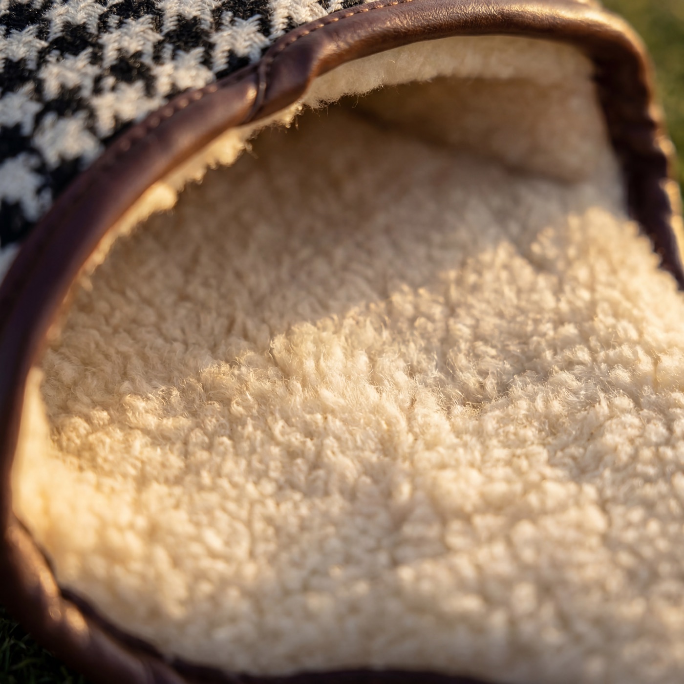 Macro of the soft cream wool fleece lining inside the cover